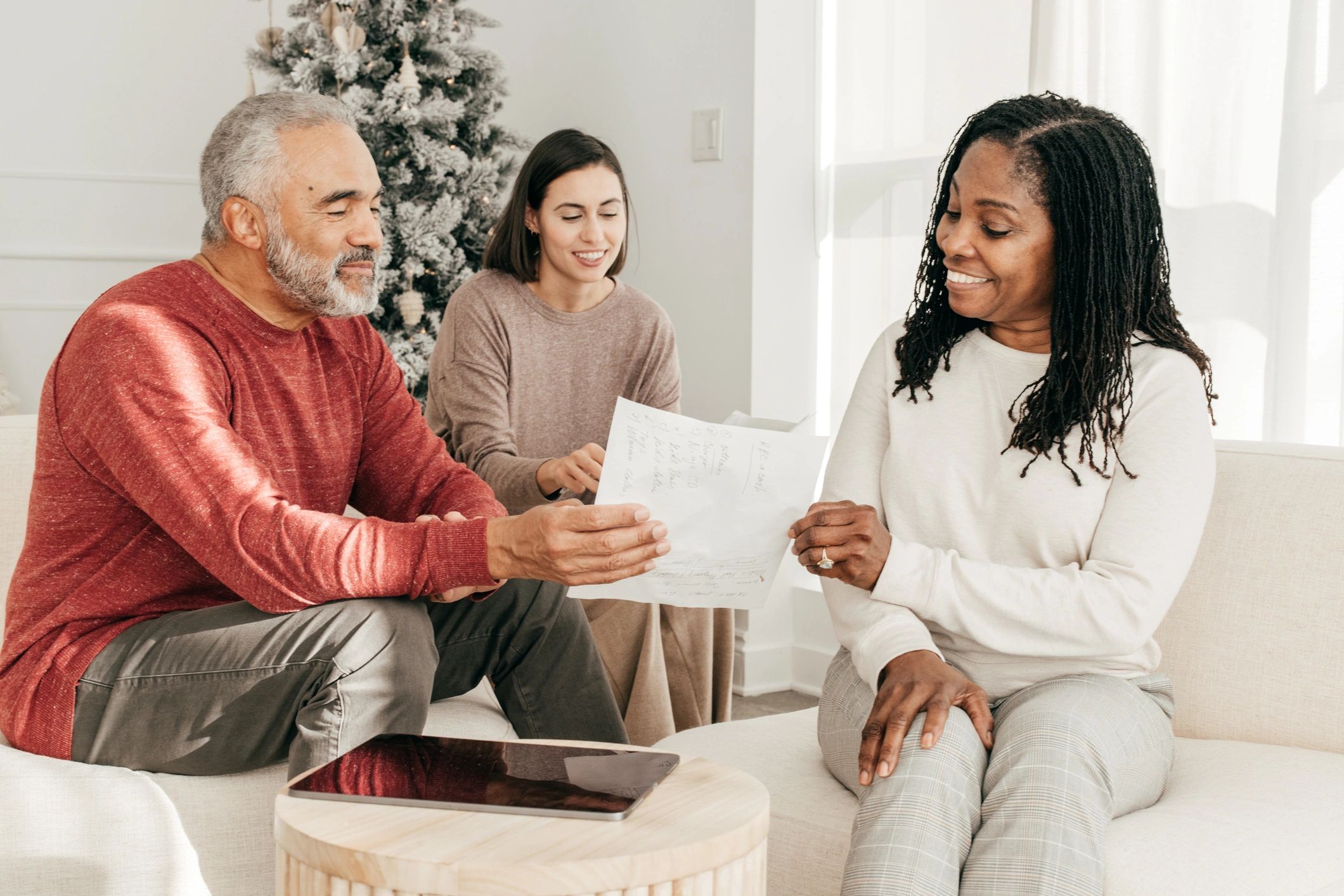 Volunteer helping a client with financial paperwork