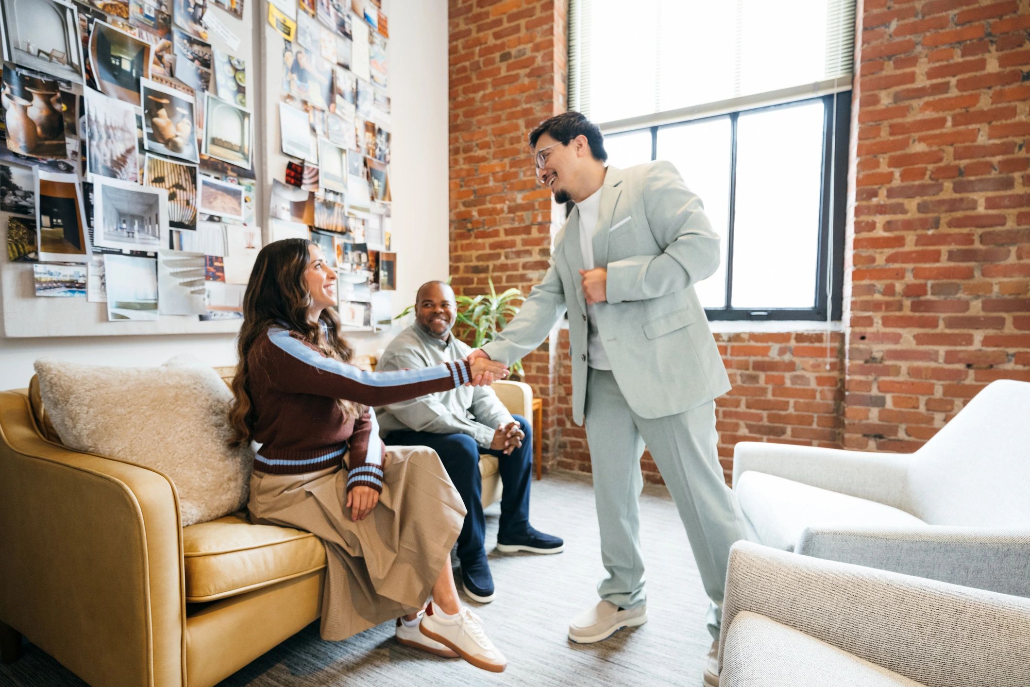 Advisor meeting with a couple to review financial documents